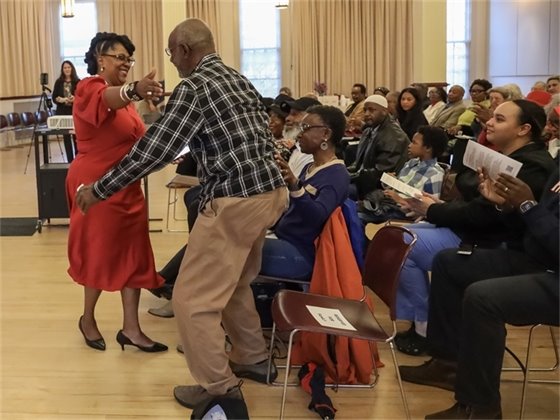 Braxton Foushee Street Dedication speaker giving Mr. Foushee a hug