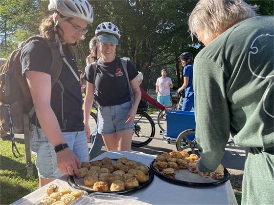 Bikers enjoy the annual Carrboro Bike Breakfast with biscuits from Neal's Deli