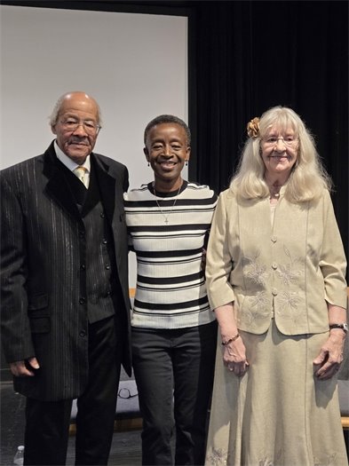 Mayor Barabara Foushee posing with two Community Treasures