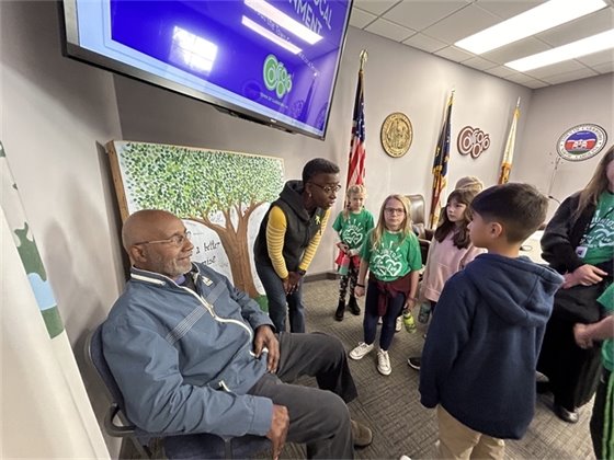 Mayor Barbara Foushee and Braxton Foushee with the third graders