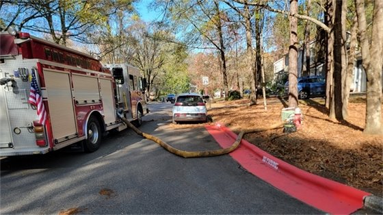 Red curb and fire truck