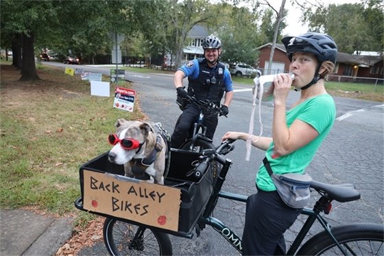Students and parents walk and roll to school on trail. 