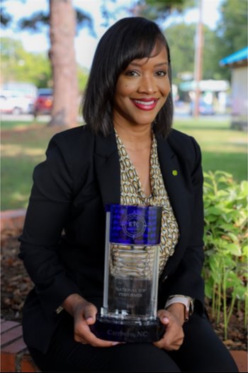 Town Manager Toney with Award