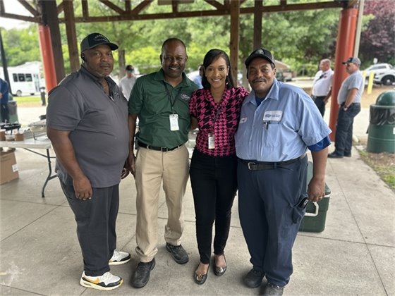 New Town Manager, Patrice Toney stands with Public Works employees at the Employee Picnic