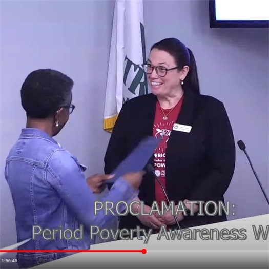 Mayor Foushee presents the COO of the Diaper Bank of NC