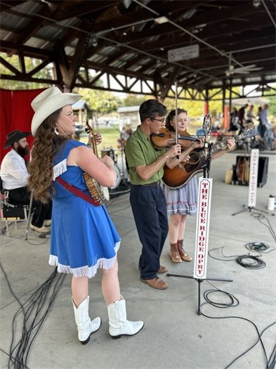 Carrboro Community claps along with music from a Freight Train Blues Concert at Carrboro Town Commons