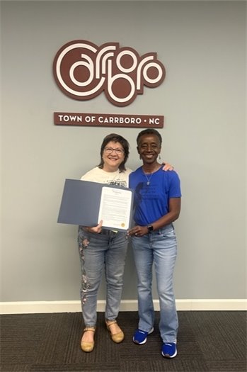 Mayor Foushee presenting the Arbor Day Proclamation