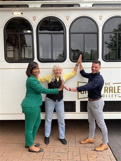 Carrboro team in front of Trolley
