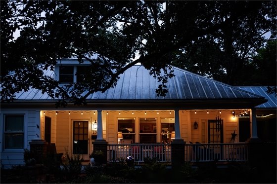 House with lights on at night