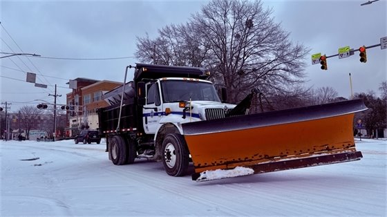 Snow plow at work in Carrboro 